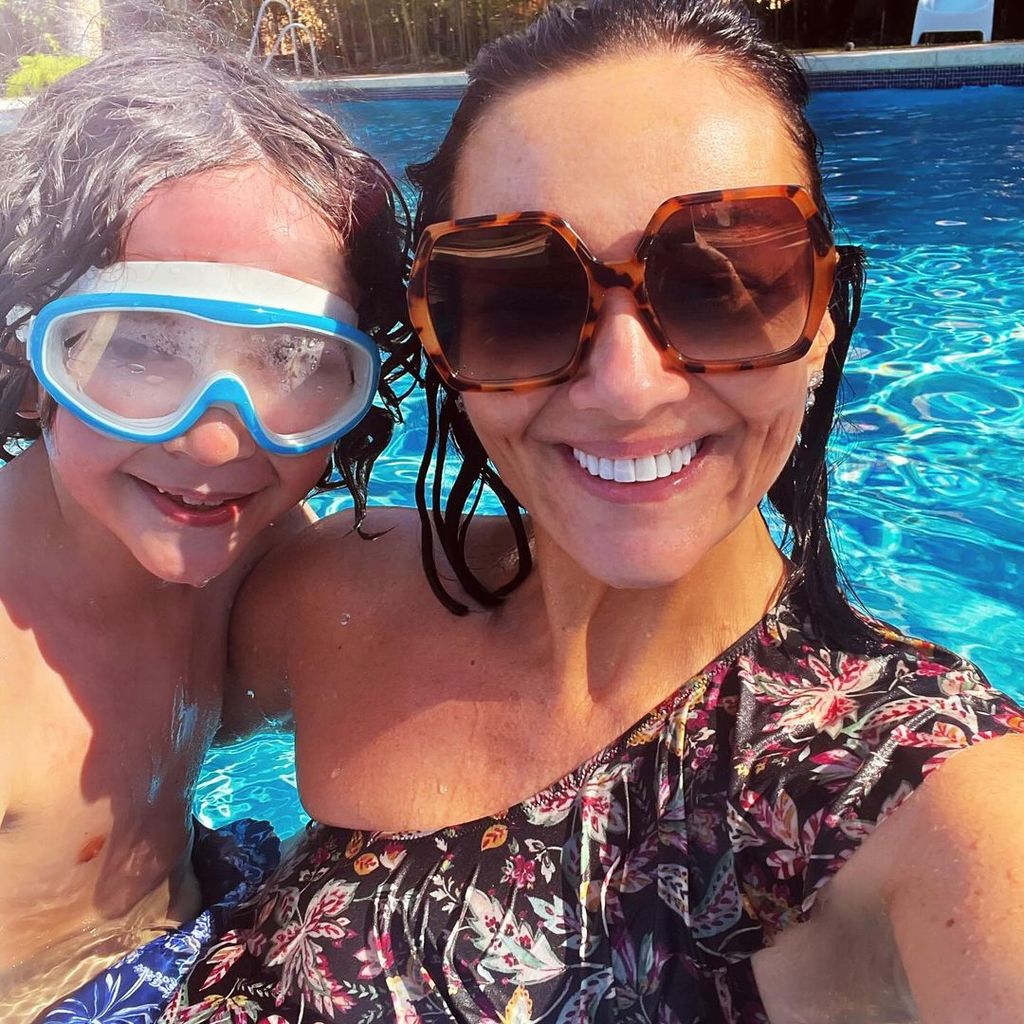 Martine McCutcheon in the pool with her son