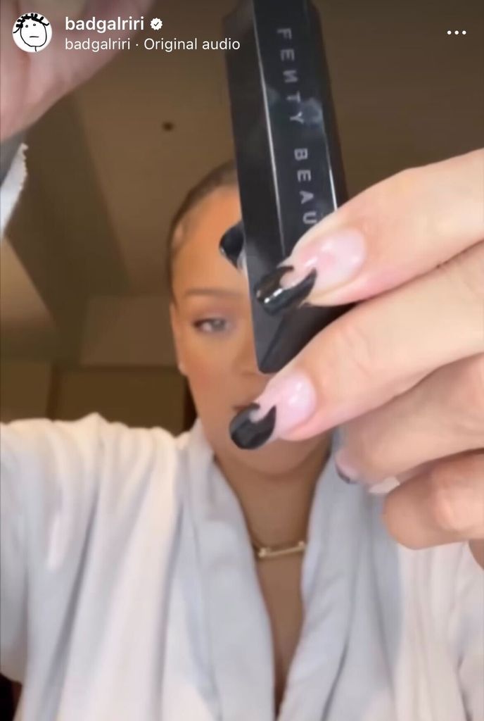Rihanna showing her Instagram followers her Hella Thicc mascara