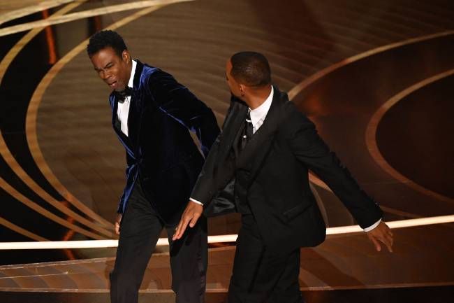 Chris Rock gets slapped by Will Smith at the Oscars