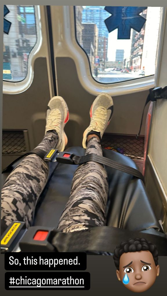 TJ Holmes shares a photo from inside an ambulance on a stretcher after the Chicago Marathon, shared on Instagram Stories