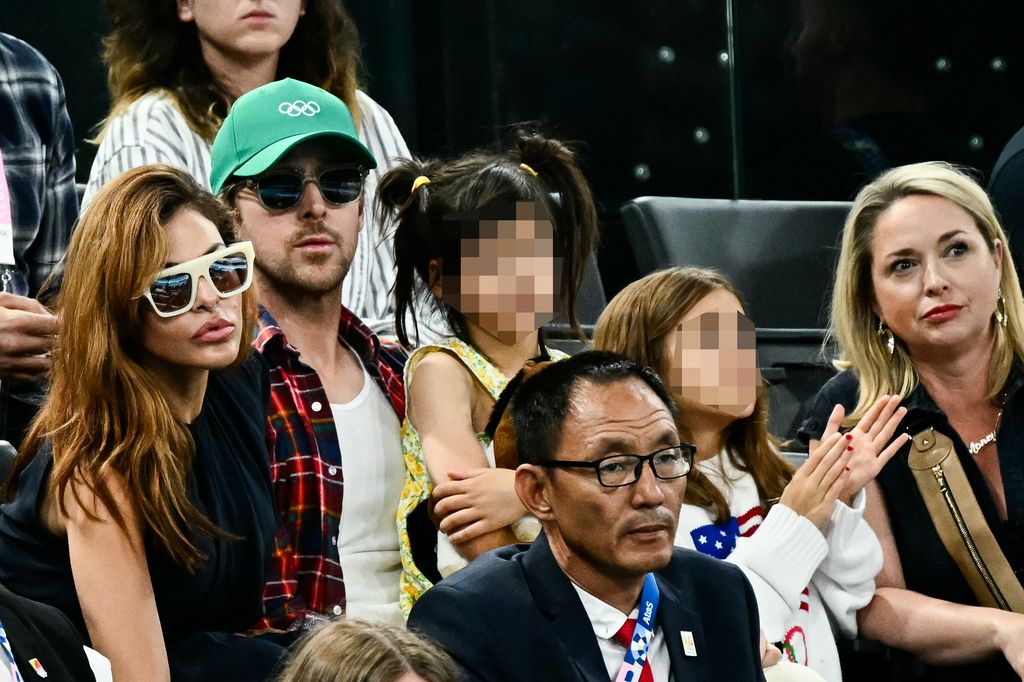 Eva Mendes and Ryan Gosling attend the artistic gymnastics women's uneven bars final during the Paris 2024 Olympic Games at the Bercy Arena in Paris, on August 4, 2024