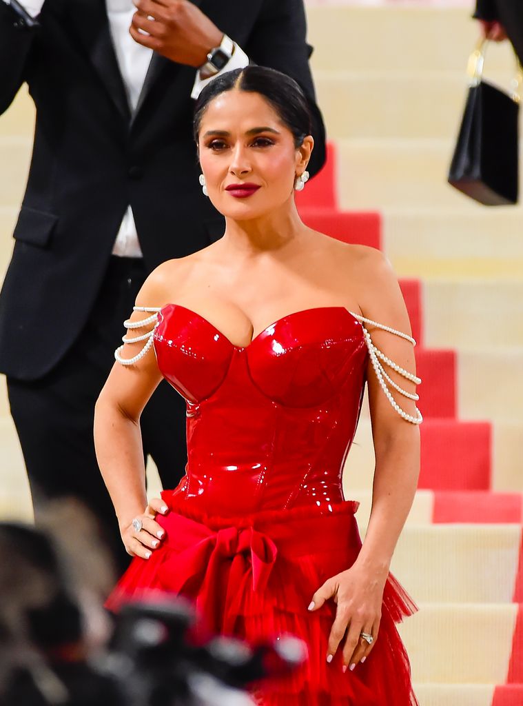 Salma Hayek wears a red dress at the Met Gala