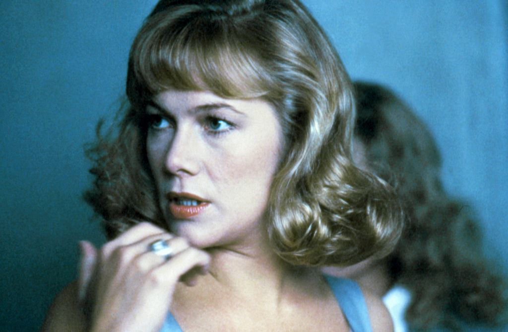 Kathleen Turner with curled hair 