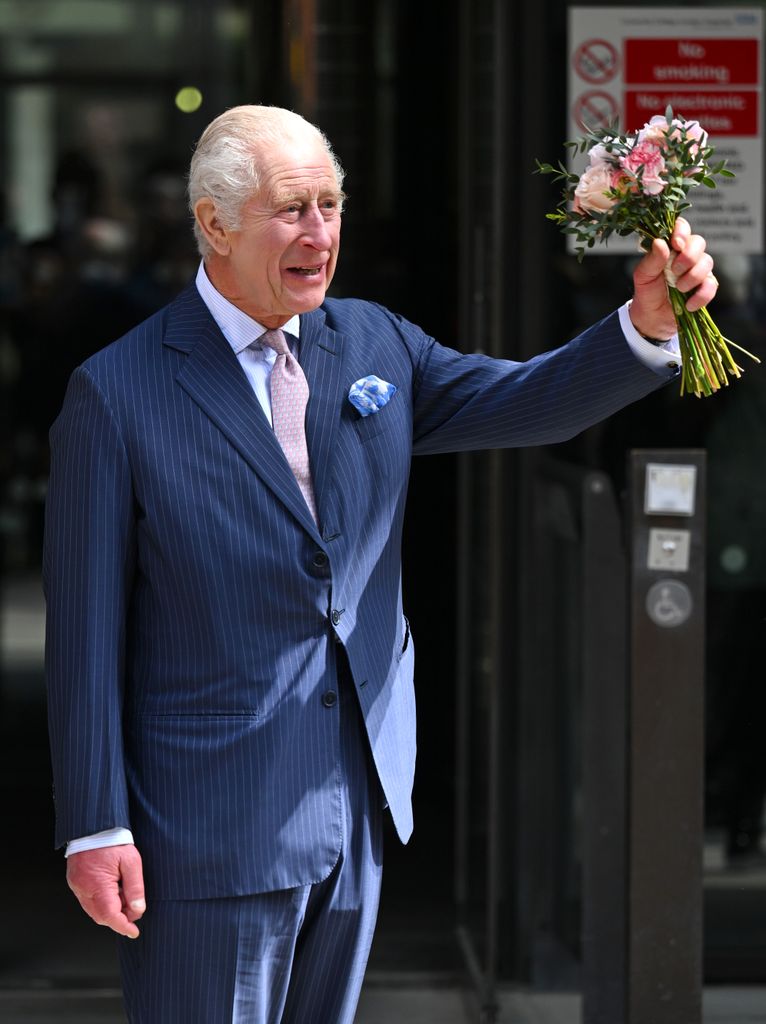 King Charles with bouquet of flowers