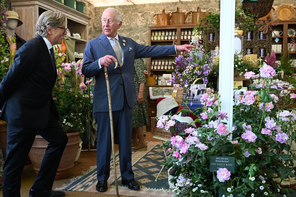 King Charles with a walking stick at Chelsea Flower Show