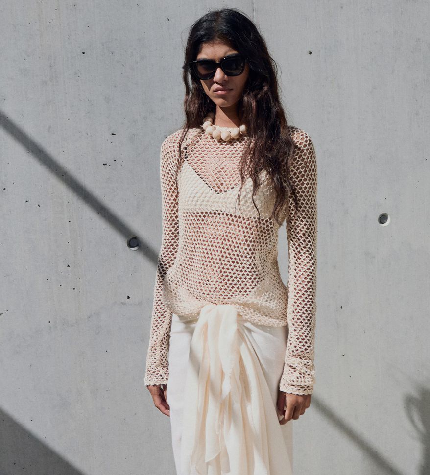 Mango model wearing a crochet top