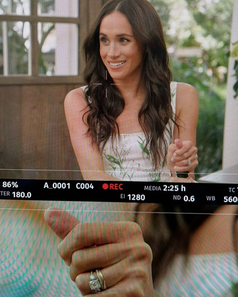 A still from Meghan Markle's Netflix series showing a close-up of her engagement ring