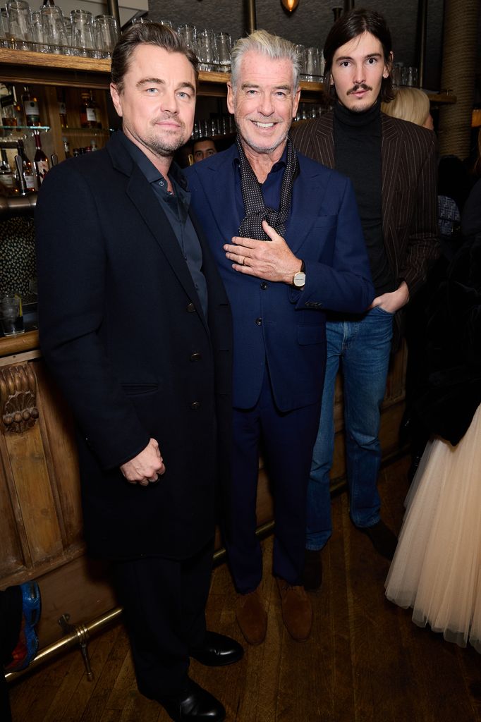 Leonardo DiCaprio, Pierce Brosnan and Dylan Brosnan attend a celebration of One Battle After Another in London