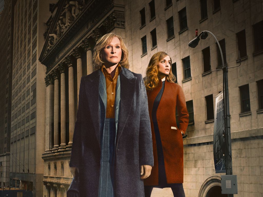 two women walking down street