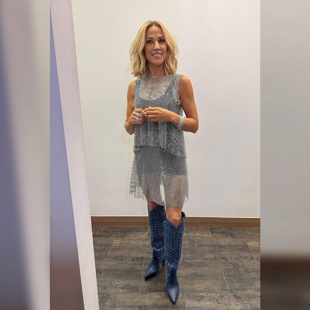 Sheryl traded her gown for a glitzy mini-dress