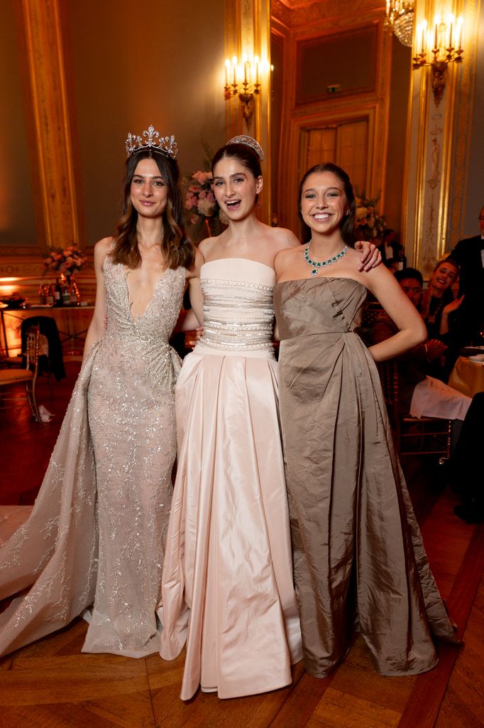 Princess Eulalia with Princess Isabelle of Orléans and Almudena Dailly of Orléans  in neutral ballgowns