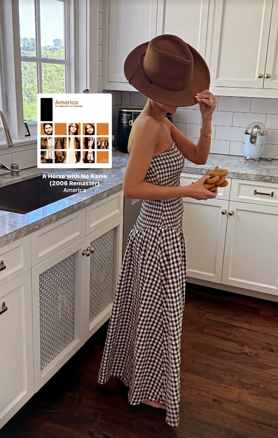 jackie apostel in a strapless gingham dress
