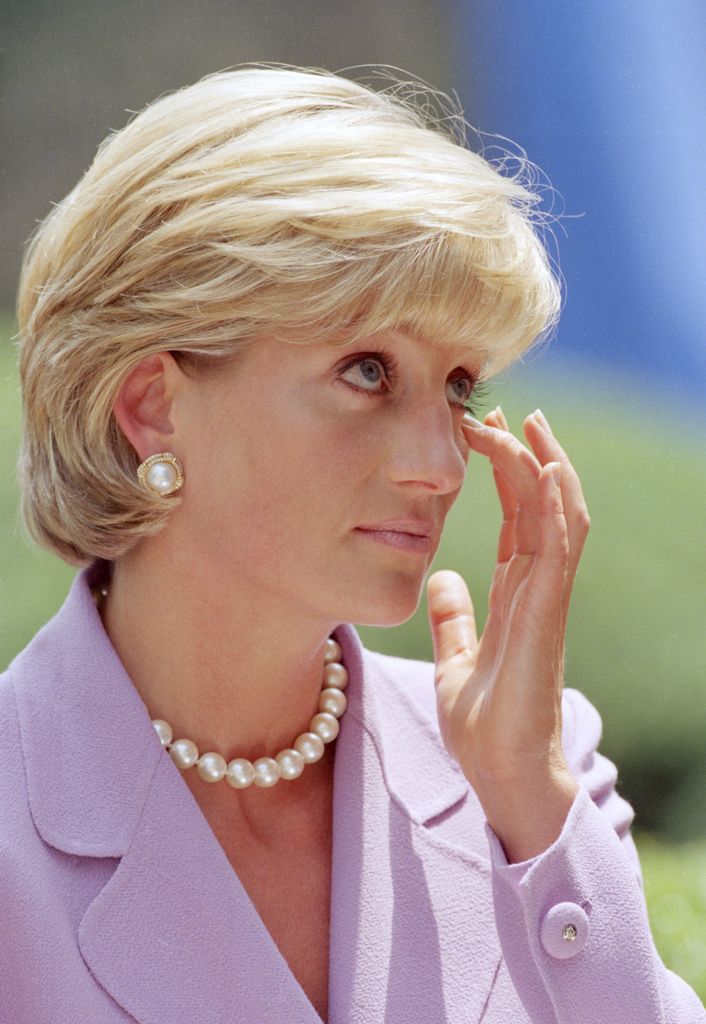 Diana, The Princess Of Wales Visits Washington, Usa.Anti-Landmines Speech At The Red Cross Headquarters wearing purple blazer and pearls