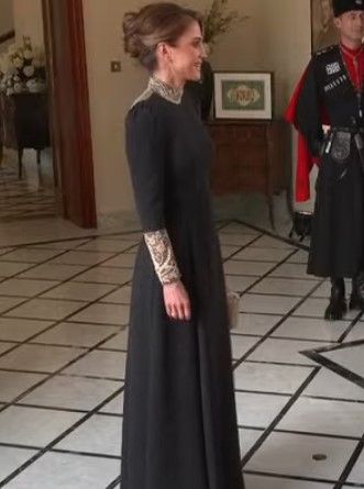 Queen Rania wearing black dior gown greeting guests at Crown Prince Hussein and Rajwa Al Saif's royal wedding
