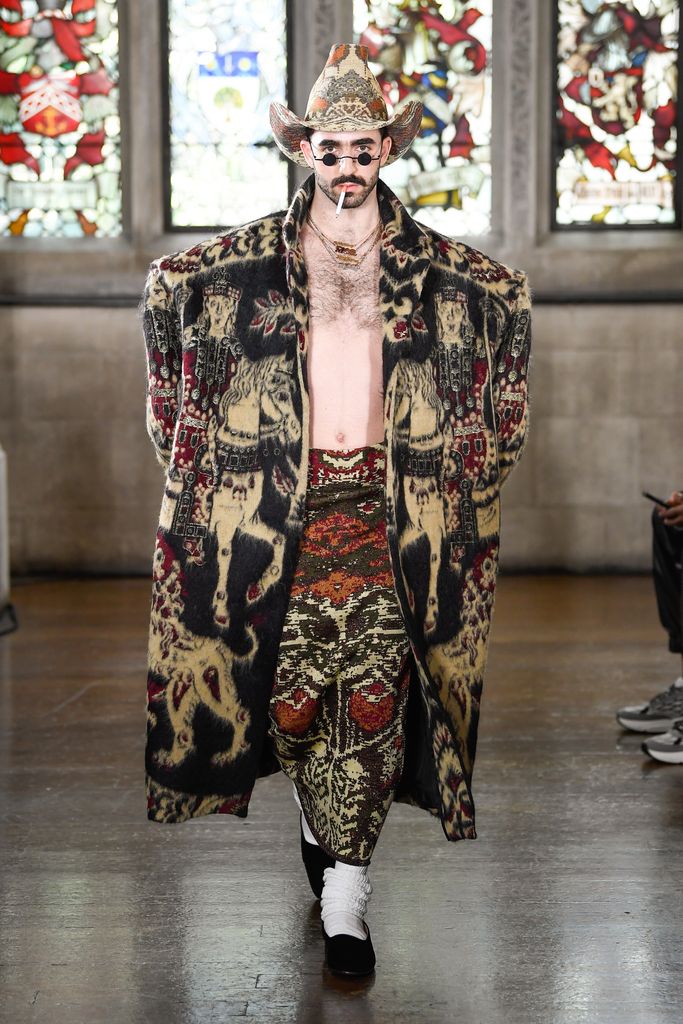 Model walks the runway at Edward Crutchley RTW Fall 2024 as part of London Ready to Wear Fashion Week held at Ironmongers Hall on February 16, 2024 in London, England.