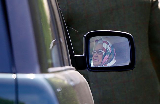 queen driving car mirror