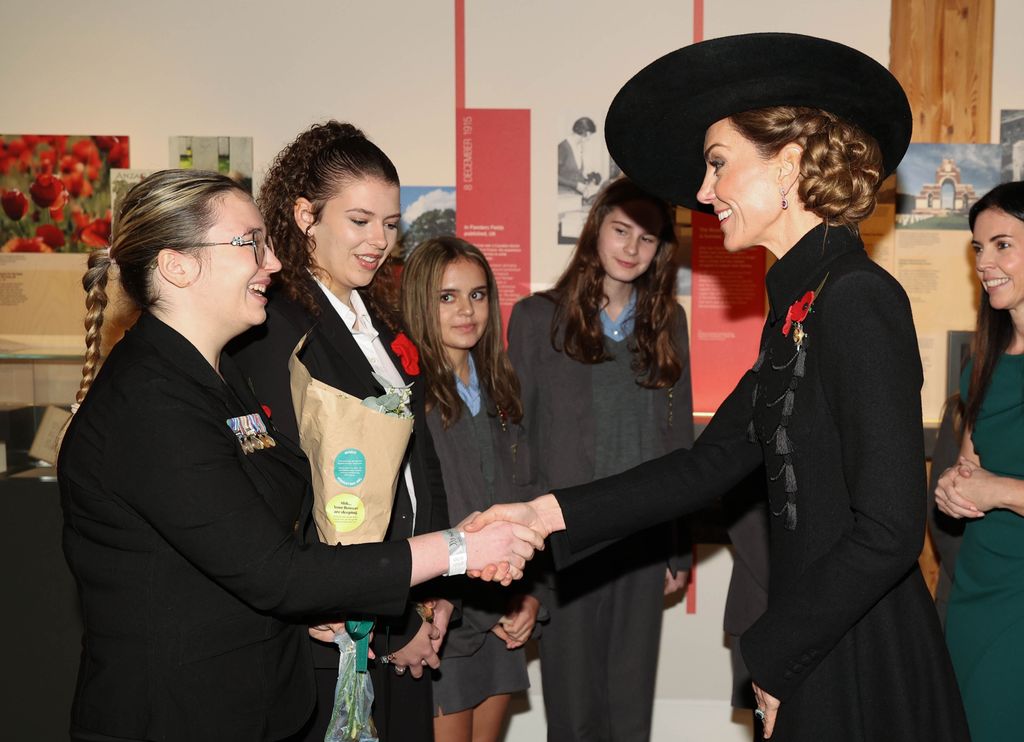 Princess Kate shaking hands with school pupils