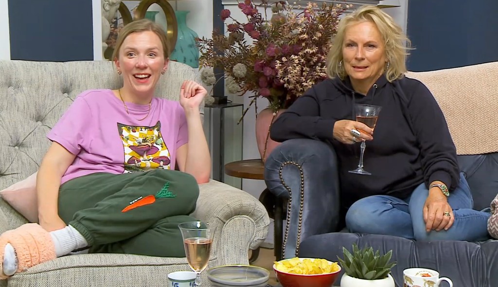 Beattie Edmonson and Jennifer Saunders sitting next to each other smiling