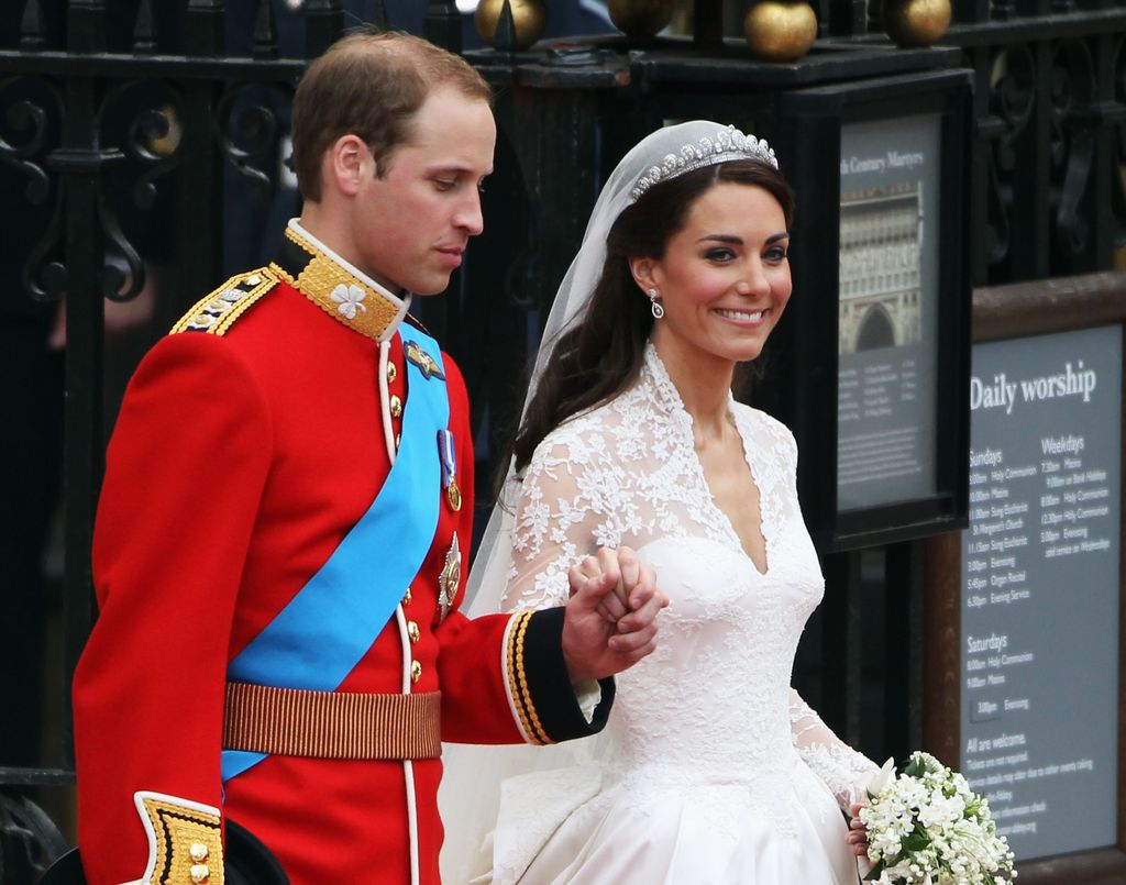 Prince William holding hands with Kate Middleton on his wedding day