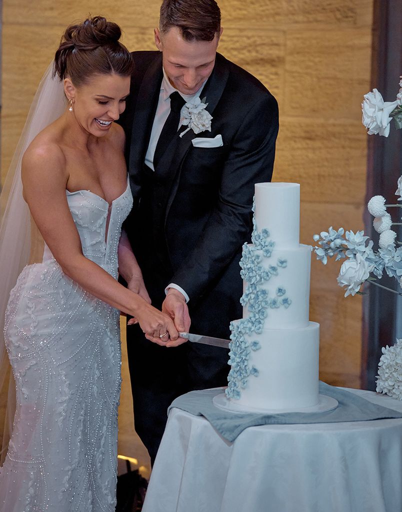 Rhi and Jeff cutting their wedding cake in MAFS