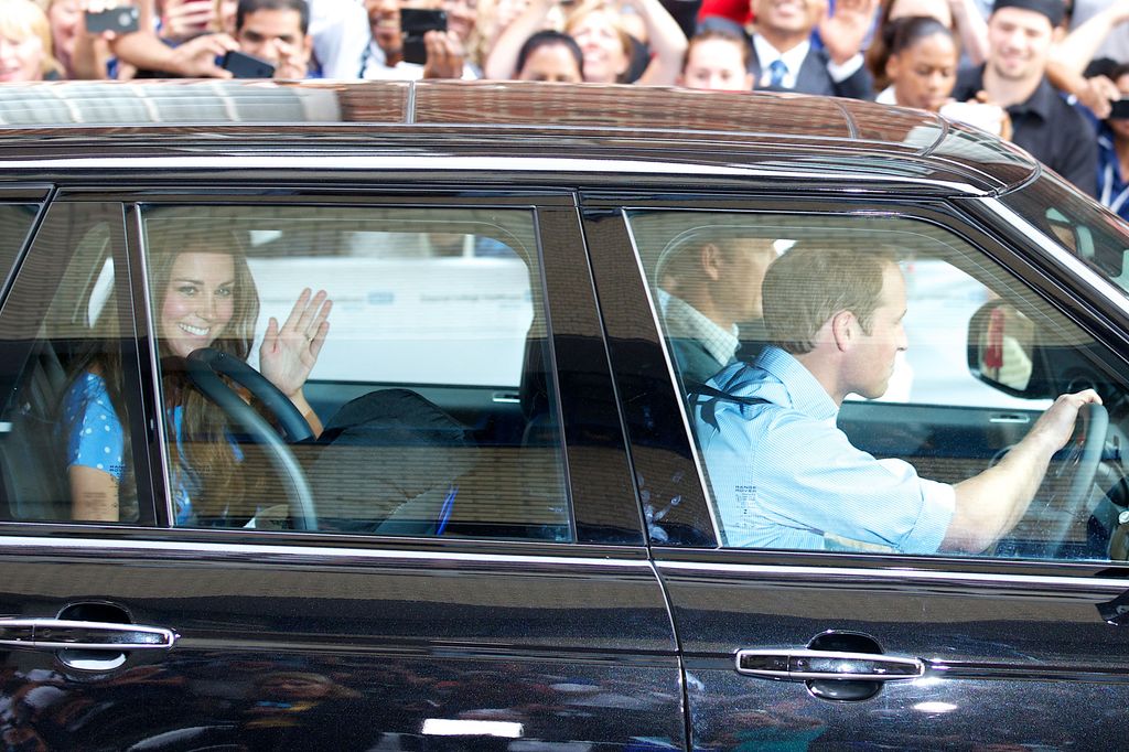 William driving Kate and baby George home from the Lindo Wing in 2013