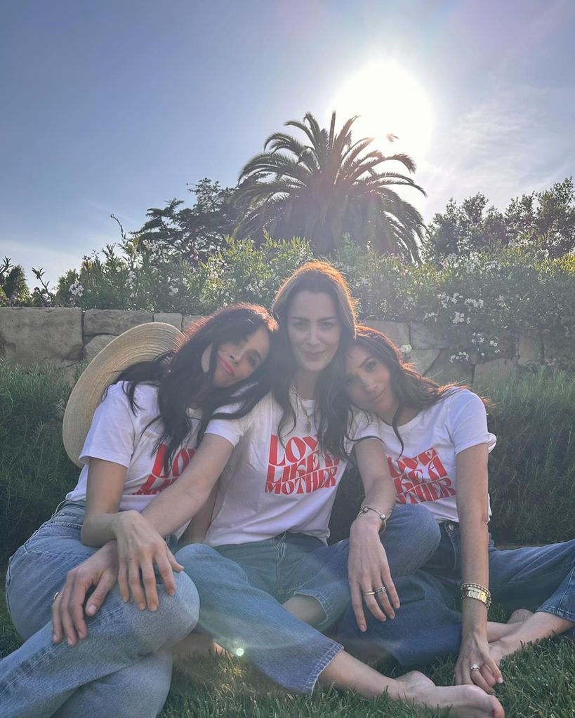Abigail Spencer, Kelly McKee Zajfen and Meghan Markle wearing t-shirts and denim