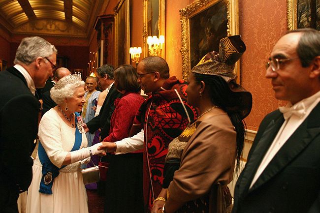 queen greets guests at diplomatic reception