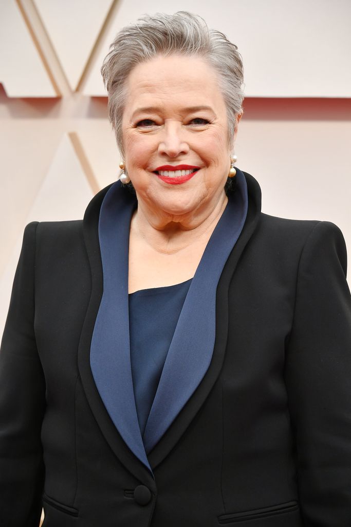 Kathy Bates smiling on the Oscars red carpet
