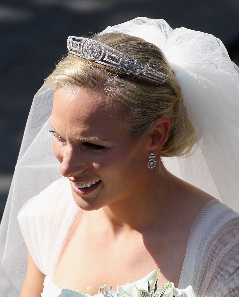 Zara Philips leaves Canongate Kirk on the afternoon of her wedding to Mike Tindall on July 30, 2011 in Edinburgh, Scotland. The Queen's granddaughter Zara Phillips will marry England rugby player Mike Tindall today at Canongate Kirk. Many royals are expected to attend including the Duke and Duchess of Cambridge.  (Photo by Chris Jackson/Getty Images)