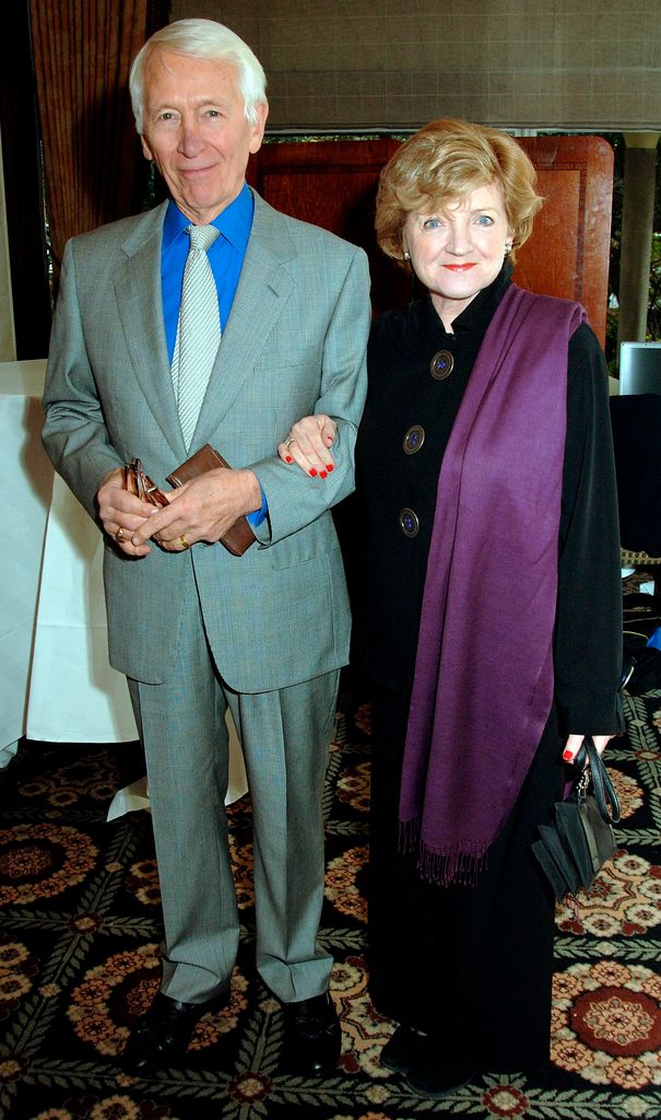 Jerry Harte standing with Julia McKenzie's arm in his