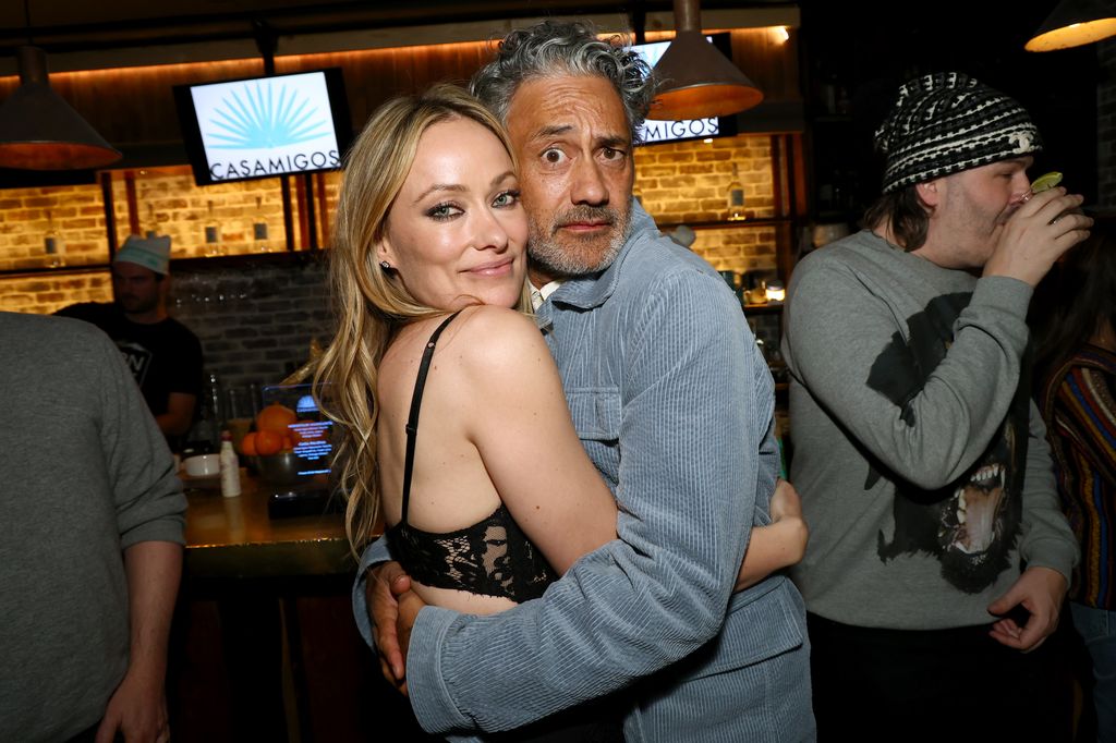 Olivia embraced Taika Waititi at The Invite after party 