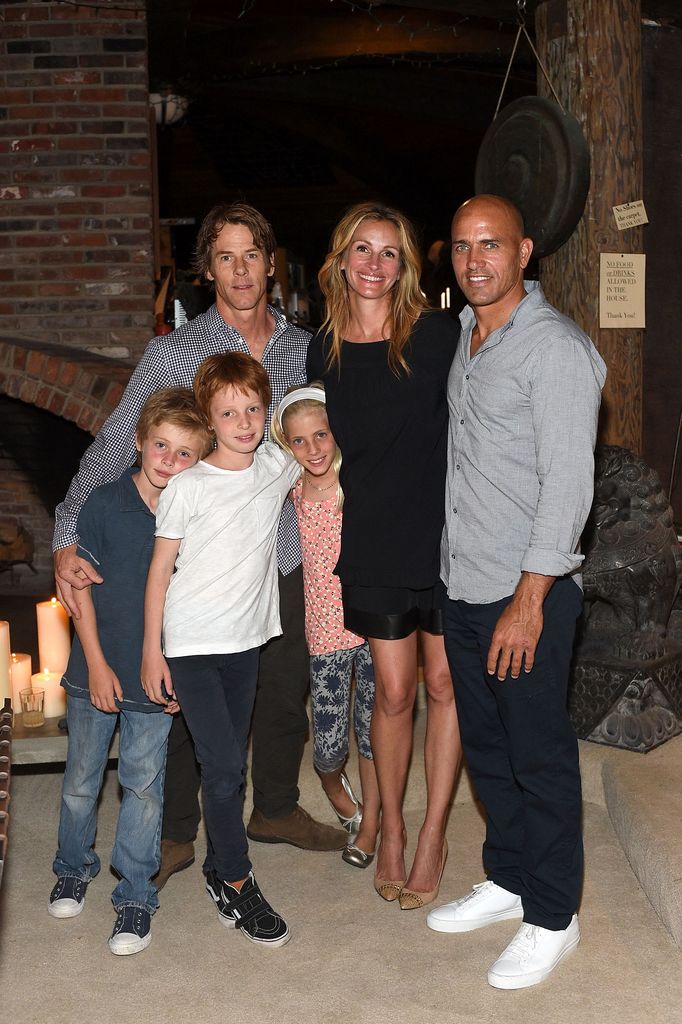 Julia, Danny and their children with surfer Kelly Slater in 2015 in Malibu