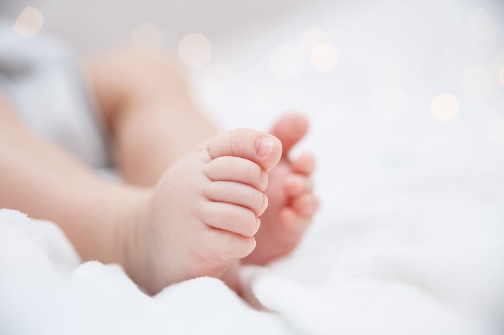 A close up of a baby's feet