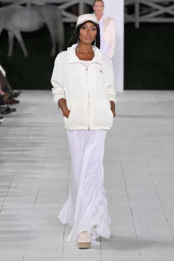 The model sported a series of white looks including a sheer ivory dress