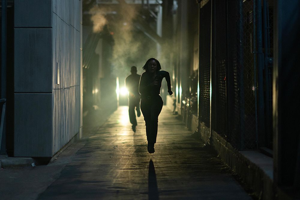 Robinson and Xavier running after Trent in Paradise