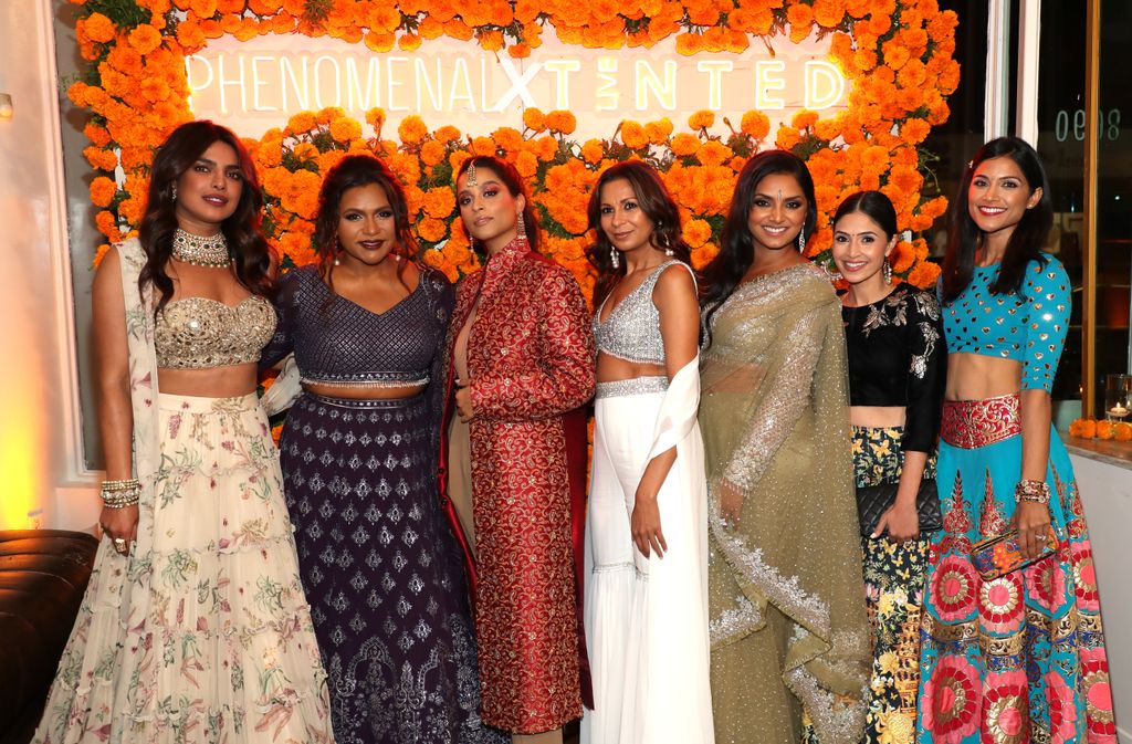 Priyanka Chopra, Mindy Kaling, Lilly Singh, Anjula Acharia, Deepica Mutyala, Payal Kadakia and Melanie Chandra attend the Phenomenal x Live Tinted Diwali Dinner Hosted by Mindy Kaling on November 03, 2021 in Los Angeles, California.