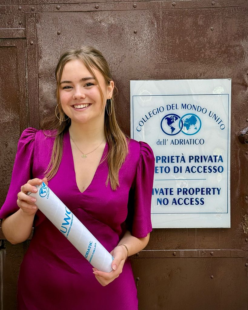 Princess Ariane holding diploma