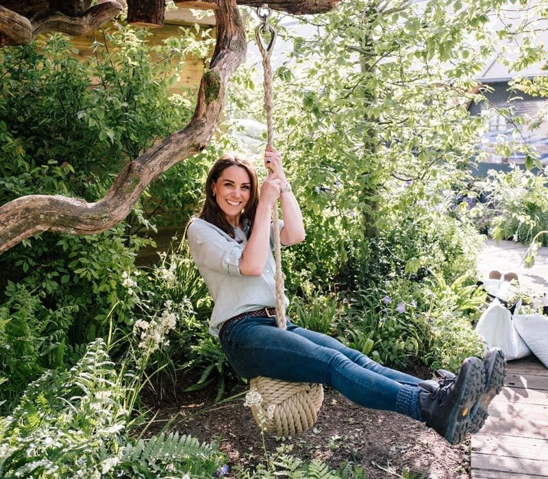 kate middleton on a swing at chelsea flower show