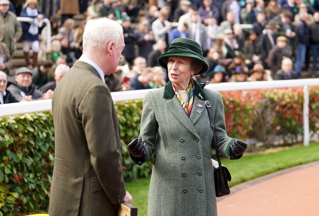 Princess Anne wearing green coat at Cheltenham