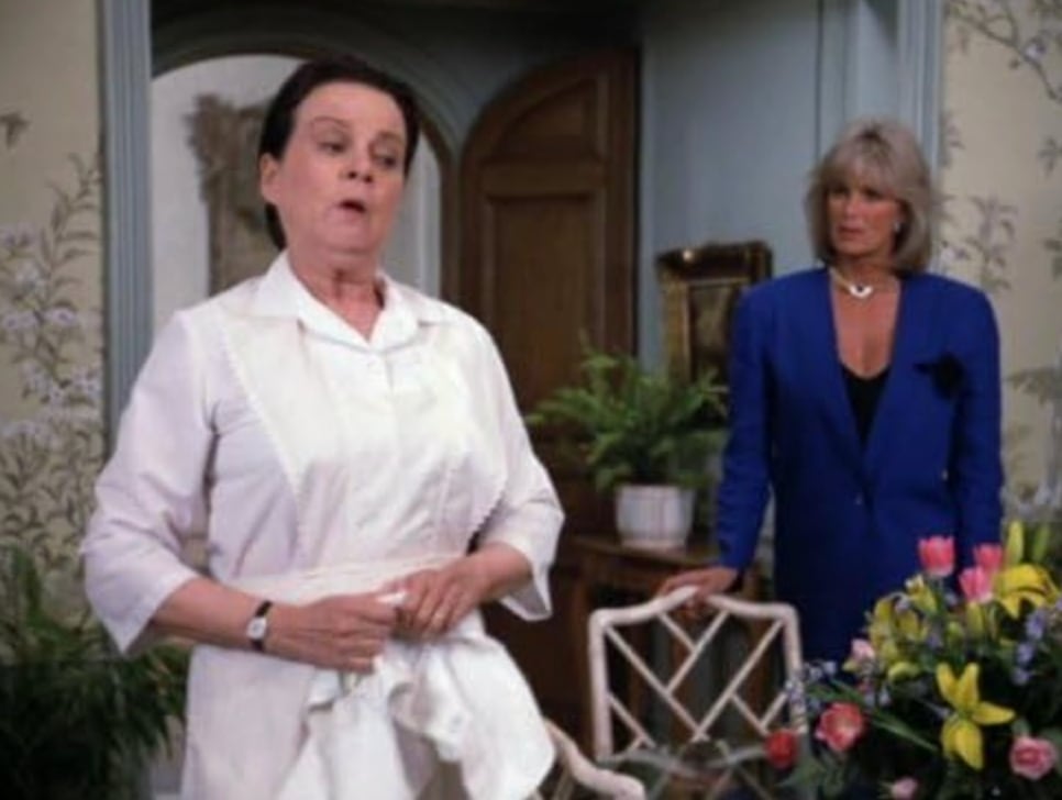 Betty as the Carrington family's cook