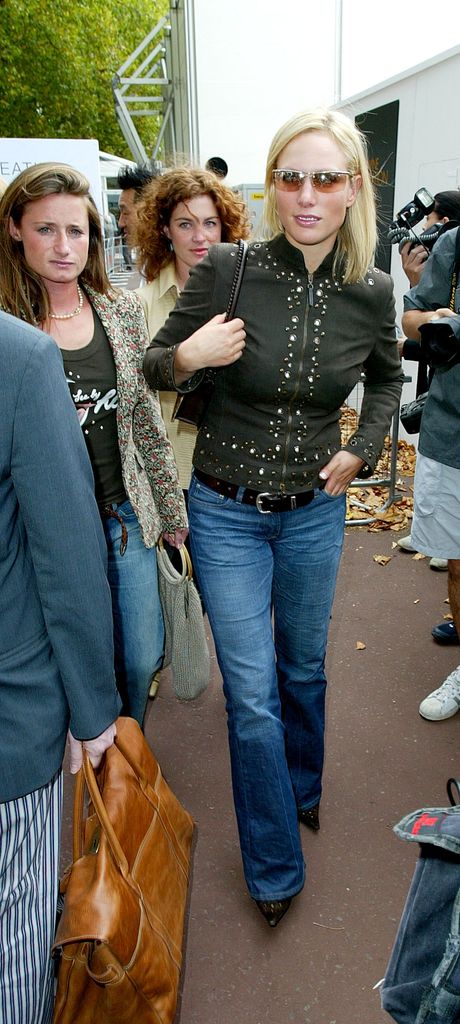 zara in low rise jeans and sunglasses
