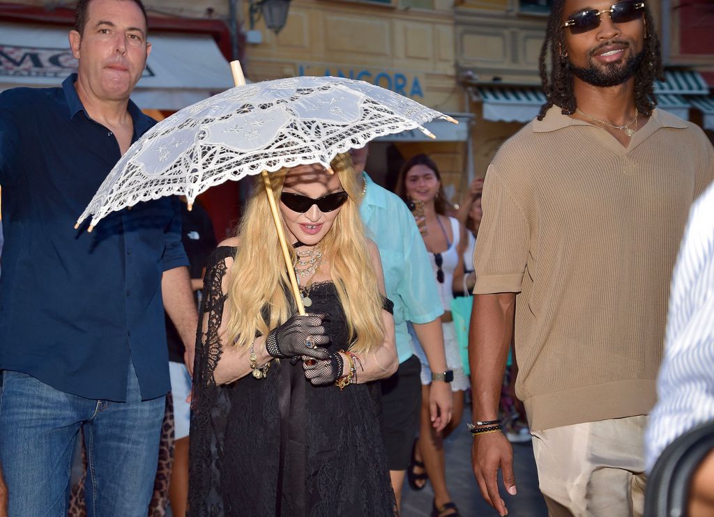 Madonna looks loved up with new boyfriend Akeem Morris, 28, ahead of ...