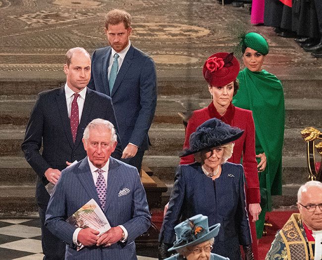 King Charles and Camilla leaving Westminster Abbey with his children behind him