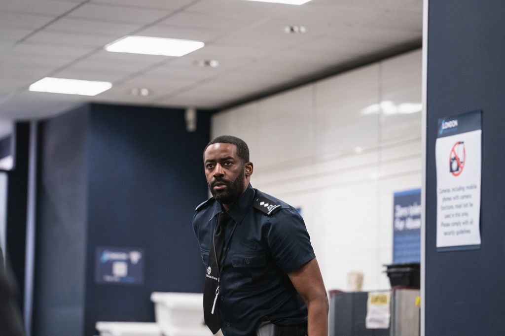 security officer standing in room