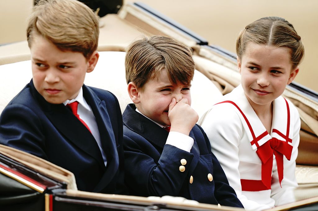 Prince Louis stifles a laugh at Trooping the Colour