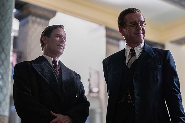 Guy Pearce and Damien Lewis stand smiling in A Spy Among Friends