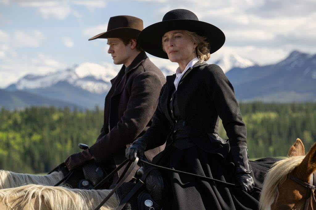 man and woman riding horses