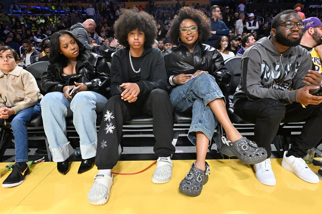 Jennifer Hudson and her son David Otunga Jr. at basketball game