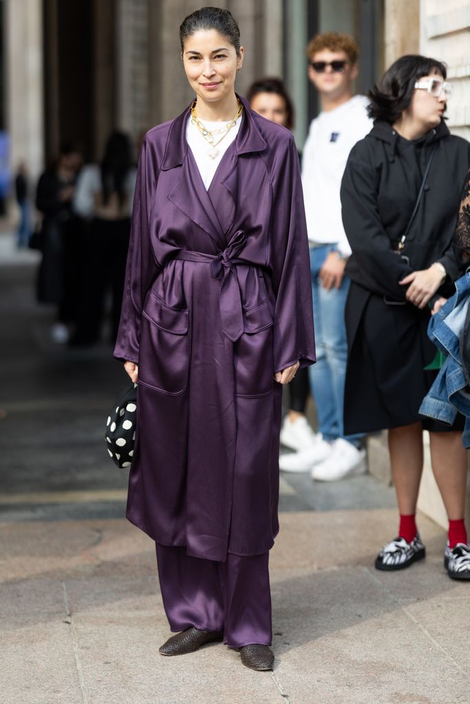 Caroline Issa opted for a black and white polka dot bag during Milan Fashion Week last week