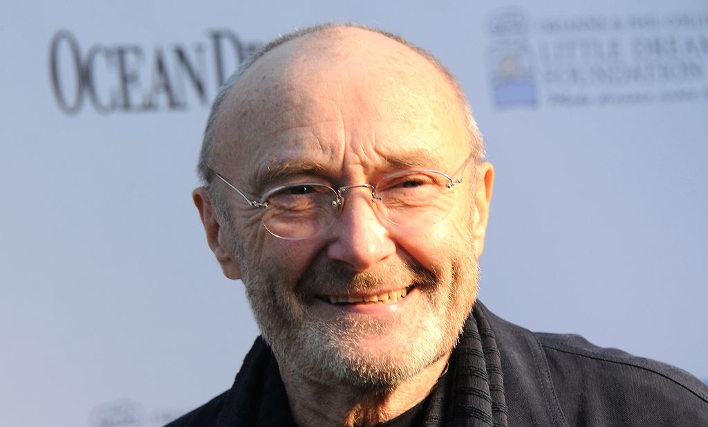 Singer and drummer Phil Collins smiling